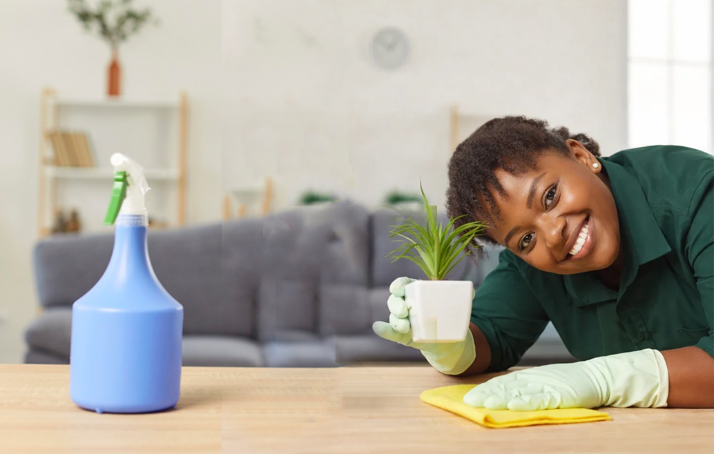 Professional cleaner holding cleaning supplies